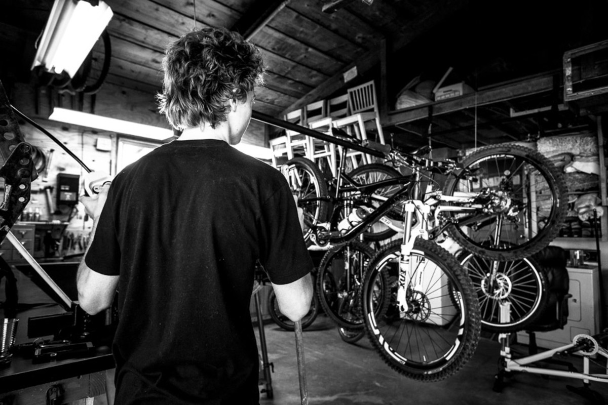 A hydraulic bike lift keeps the bike clutter high overhead.