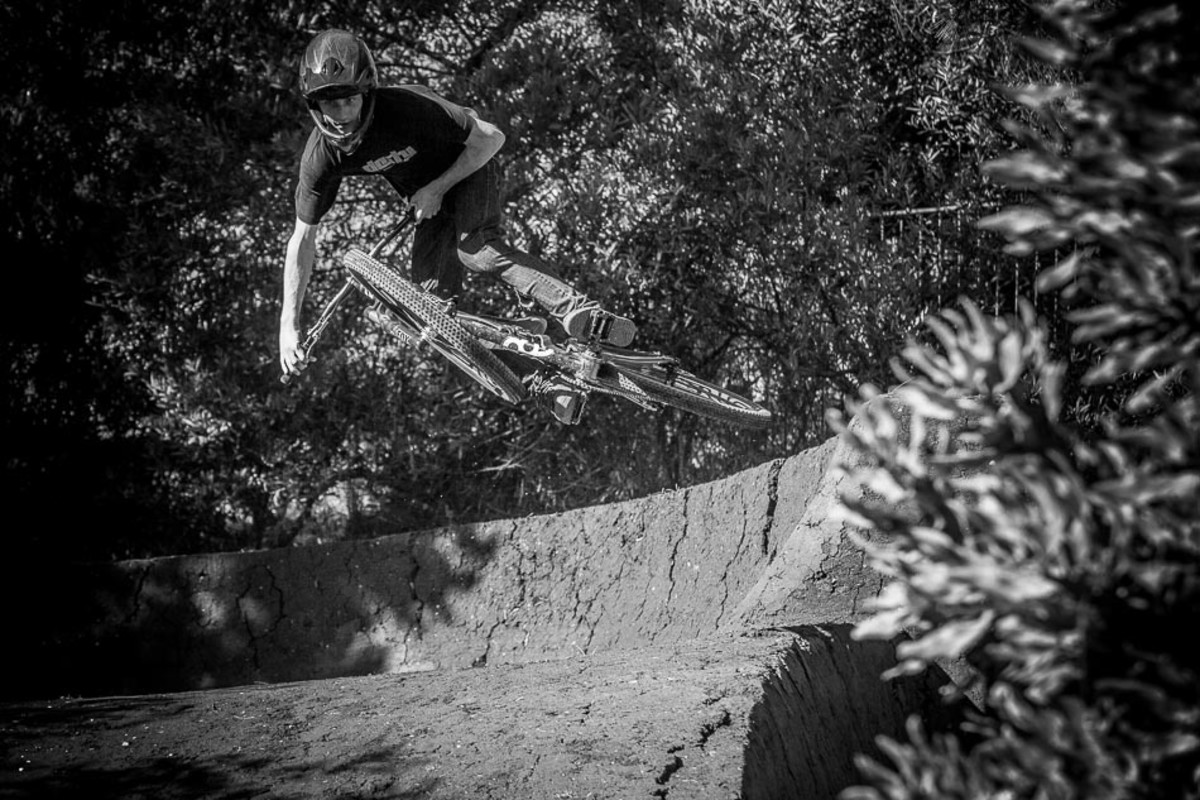 Endless hours of working in the dirt brings dreams to reality—like getting flat out of a head-high berm into a perfectly manicured landing.