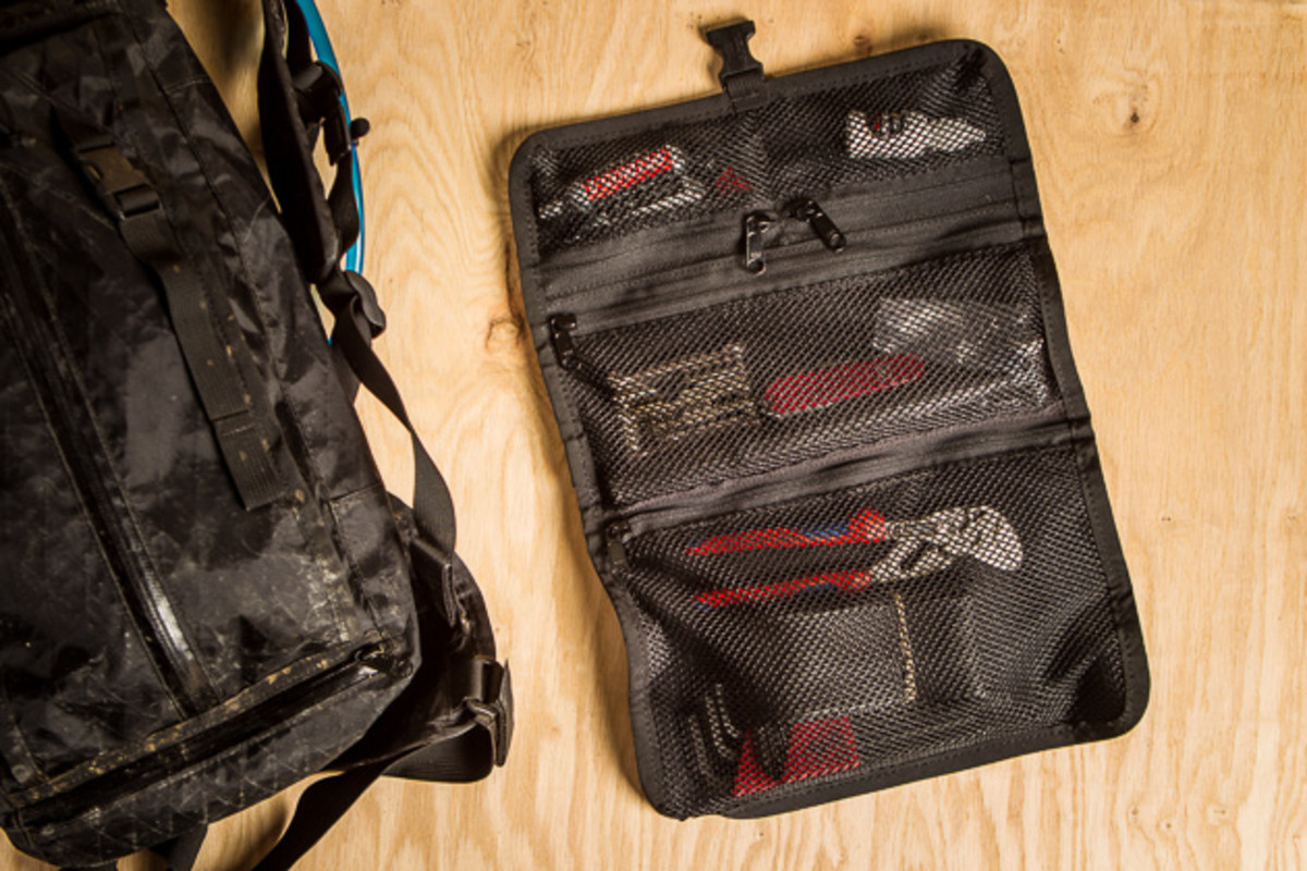 The tool roll keeps even full-size tools neatly contained and easily transferable between packs.