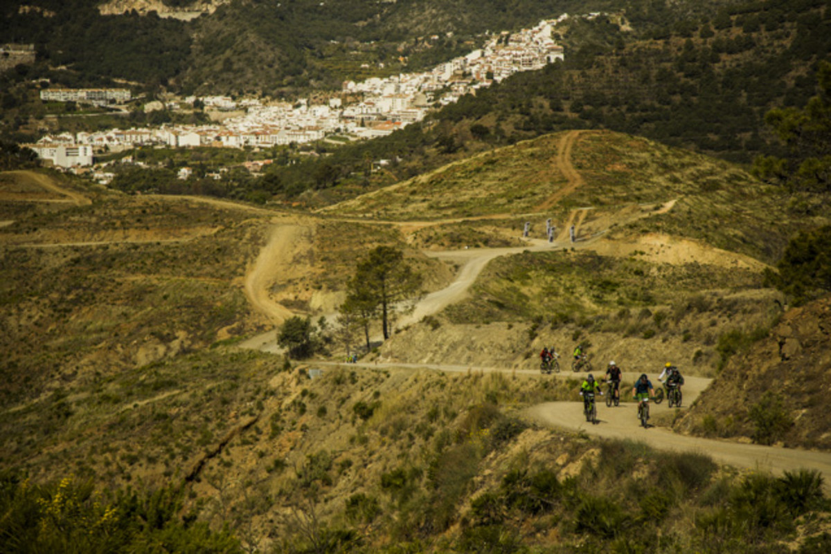 One of the great things about enduro racing is the fact that the climbs are not timed—which allows plenty of time for a good chinwag on the way up to the top. Photo by Jake Hamm.