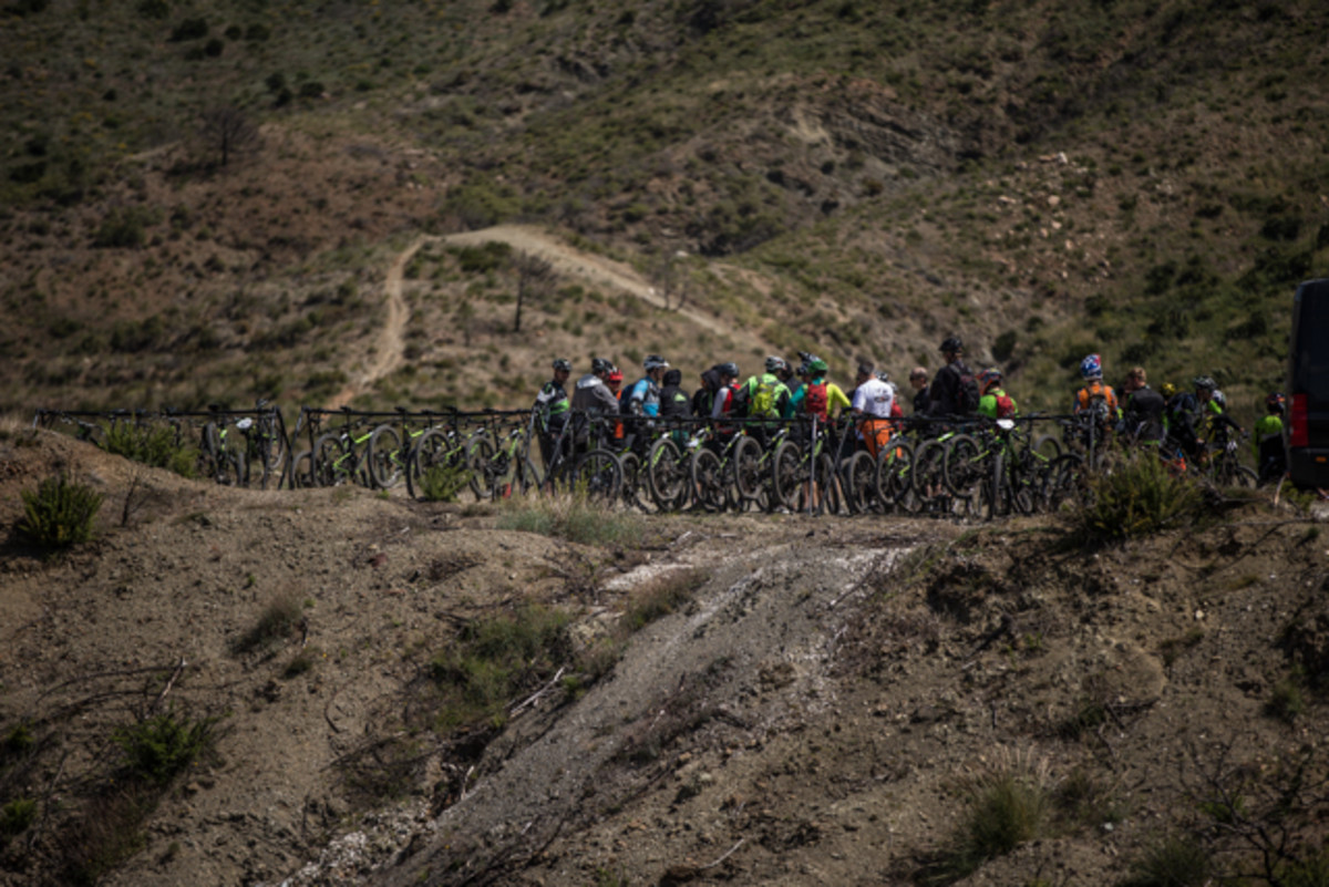 If you make it to the top of your stage quickly enough, you'll have some time for a snack and a chat before pointing your bike downhill again. Photo by Jake Hamm.