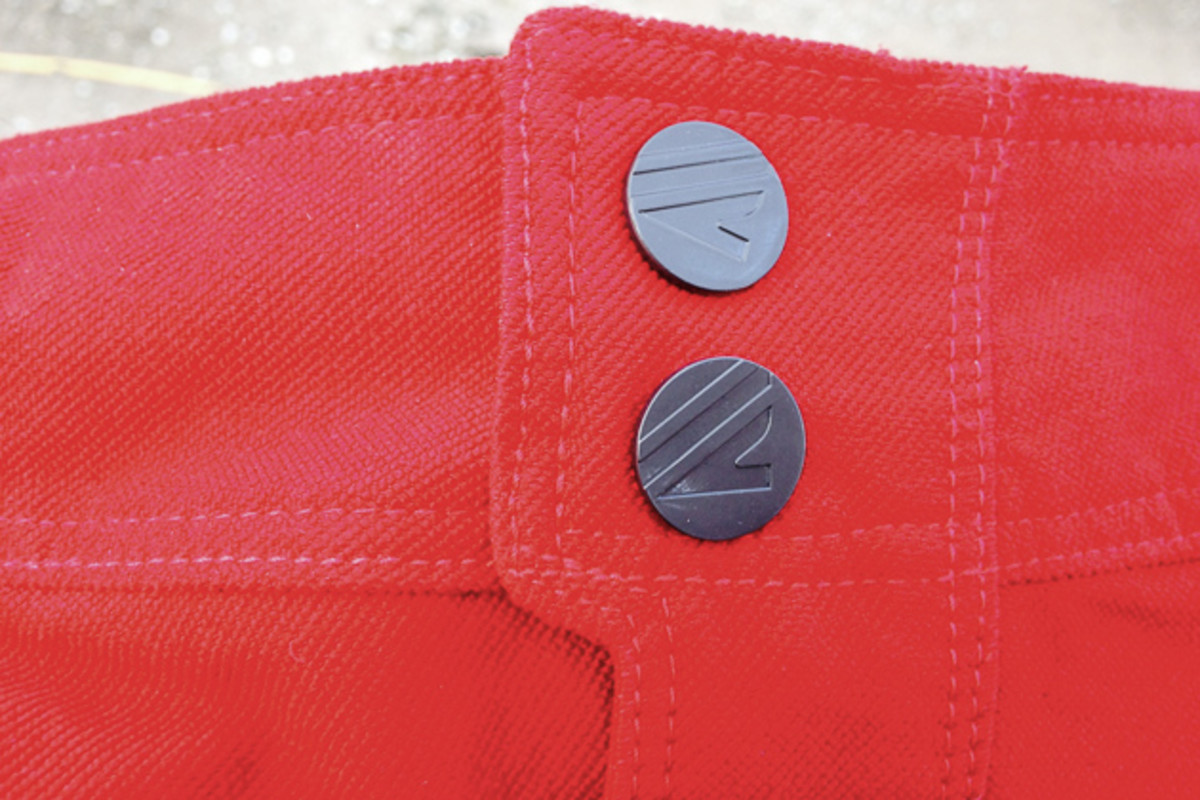 Closure is a snap, or rather, snaps. They’ll hang on even on even after a Thanksgiving feast. The provided belt loops have your back when you slim down from riding so much.
