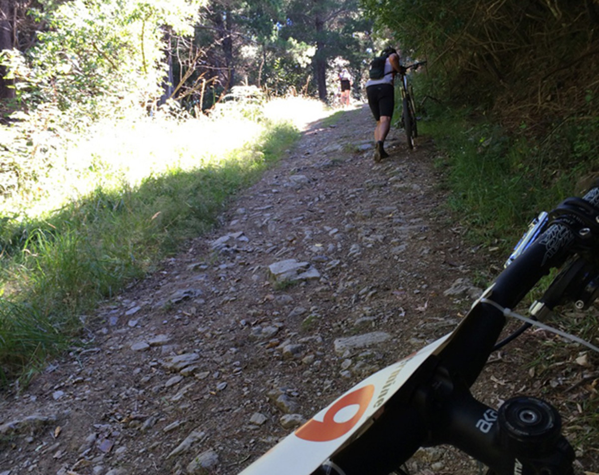 In New Zealand, it is commonplace to refer to bicycles as “pushbikes.” Somewhere around an hour into the first climb, there was plenty of pushing the bikes... PHOTO: Mike Ferrentino
