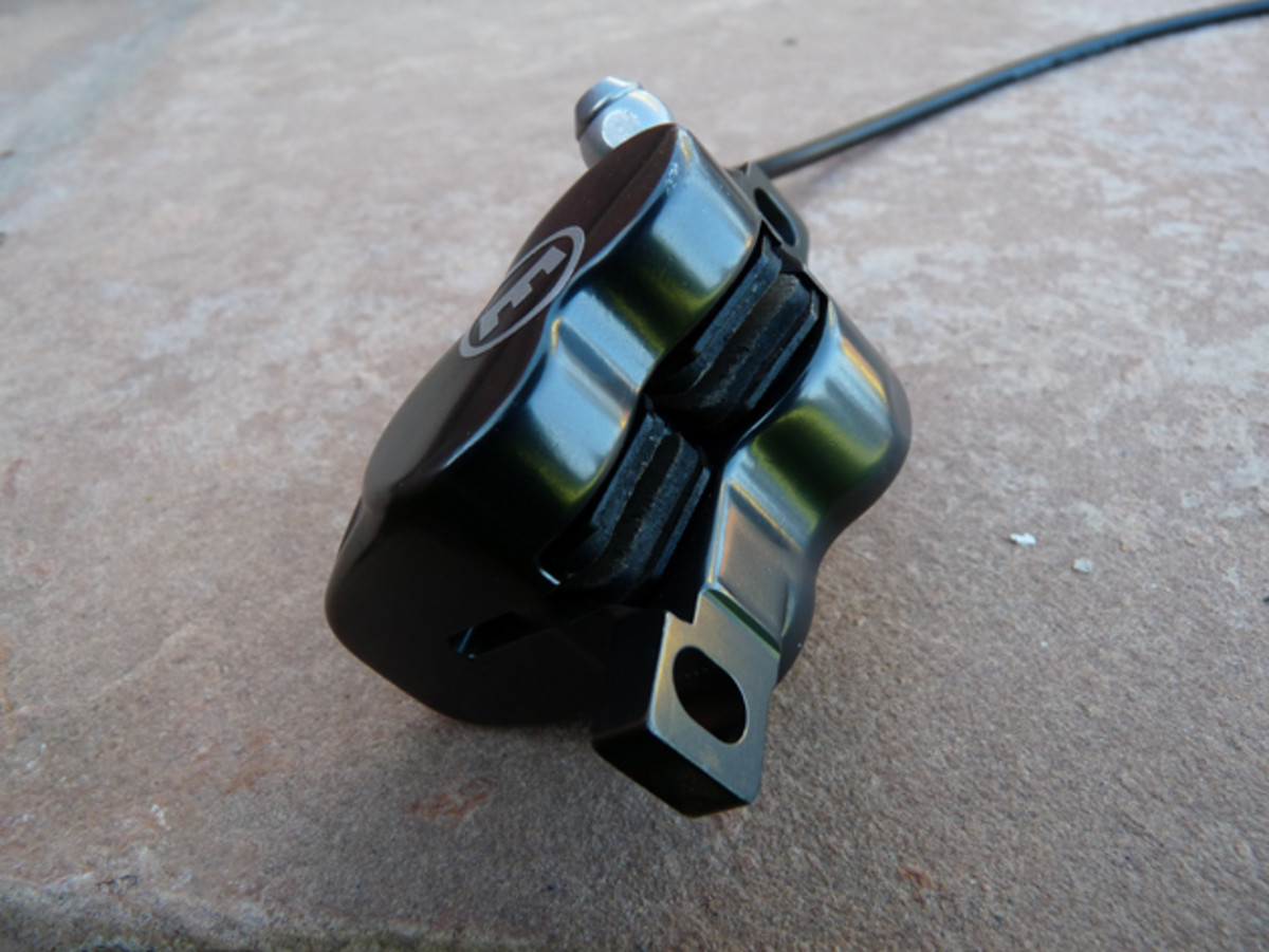 Magura says utilizing one pad per piston improves heat dissipation.