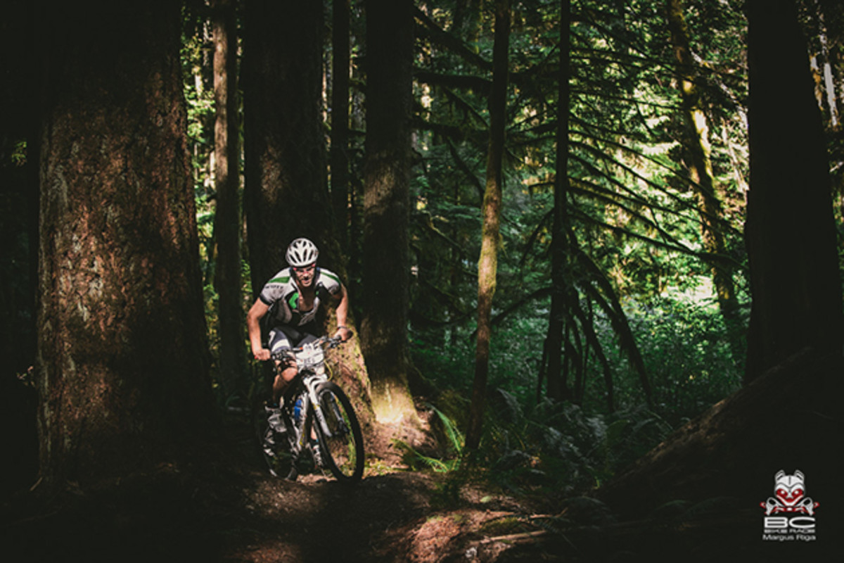 Steve Dempsey climbs under the cool canopy of Canada's west coast Rainforest. | Margus Riga