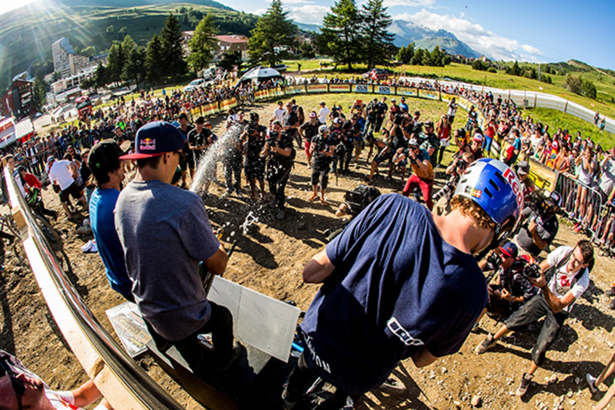 Anthony Messere, Thomas Genon and Sam Reynolds spray down the crowd. Photo: Sven Martin/Red Bull