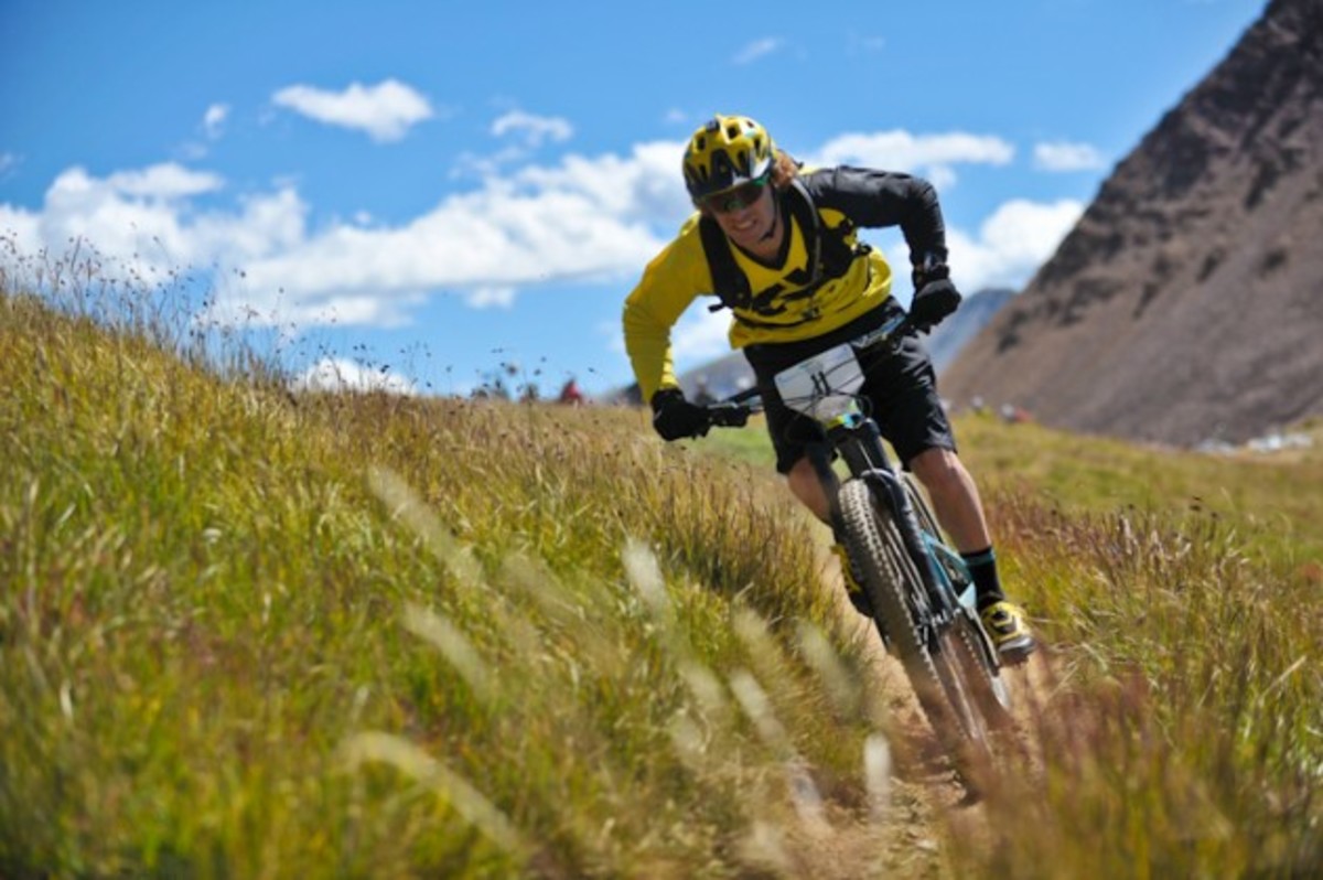 An unidentified rider rips through the high alpine.