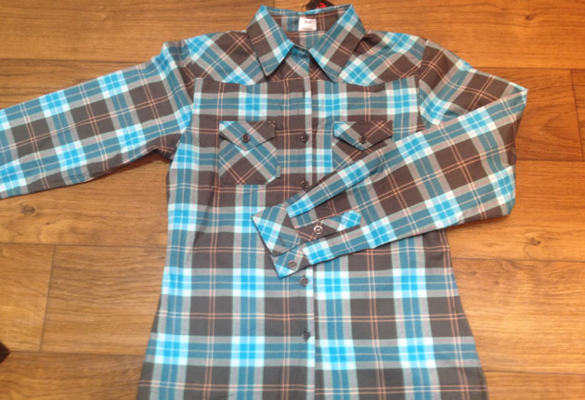 Dakine's Cypress flannel is one of the best-looking pieces in the collection. For $75, it's the perfect layer on the trail or at the bar post-ride.