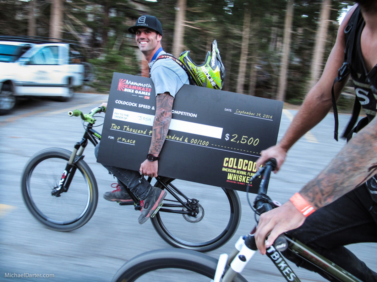 Josh Hult is all smiles after winning the Coldcock Speed and Style competition at Mammoth Mountain's 2014 Kamikaze Bike Games. Photo by Michael Darter.