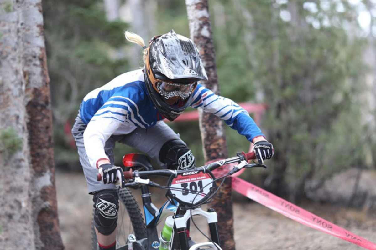Rachel Throop looking fast and smooth. Throop won the first stage, but a collision with a tree left her with a broken pinky-finger in stage two. She still completed the race and ended up 2nd overall in the pro women's field. Photo by Bogdan Marian