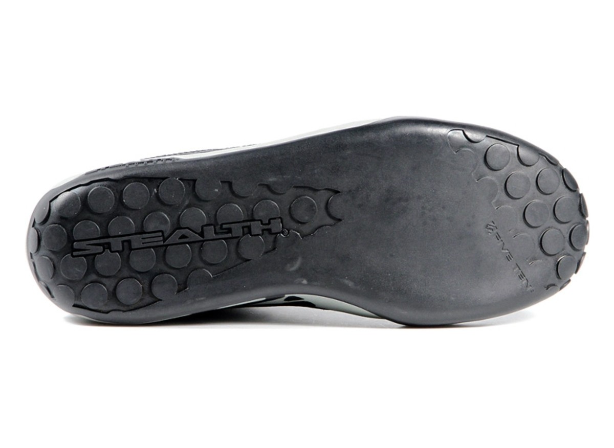 It looks like lunacy--who buys a "pre-worn" set of shoes? Ah, but that Mi6 rubber sole is seriously grippy. That giant, bald patch still offers surprisingly good traction on the pedals. It ain't winning rock-climbing contests in the wet, though. It's really more of a dry weather shoe.
