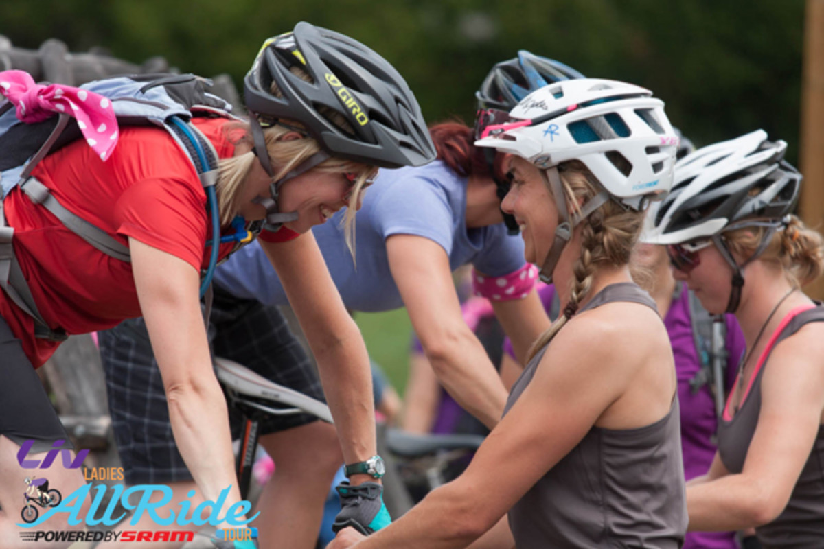 Voreis teaches a rider at her AllRide clinic that mountain biking is all about a balancing act.
