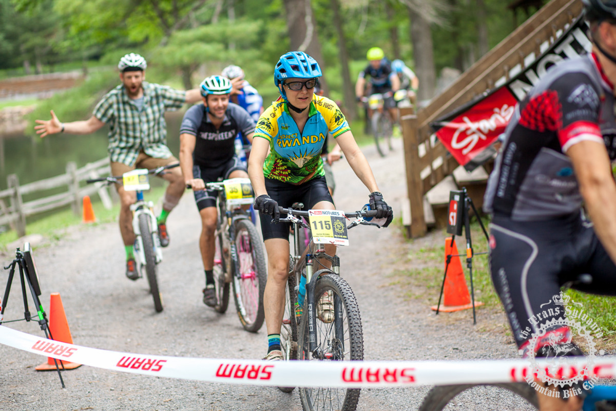 Karen Brooks (NoTubes Trans-Sylvania Epic) crosses the finish with the other singlespeeders.