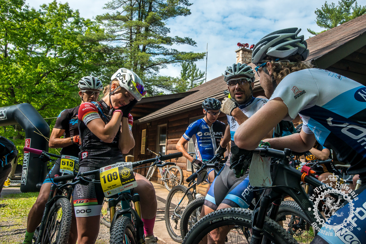 Riders chat at the start.