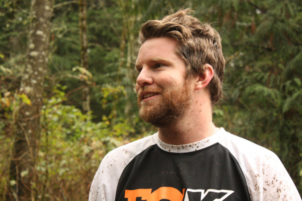 Fox suspension technician, Louis Angeley, wearing a bit of the Pacific Northwest after Lap #1.