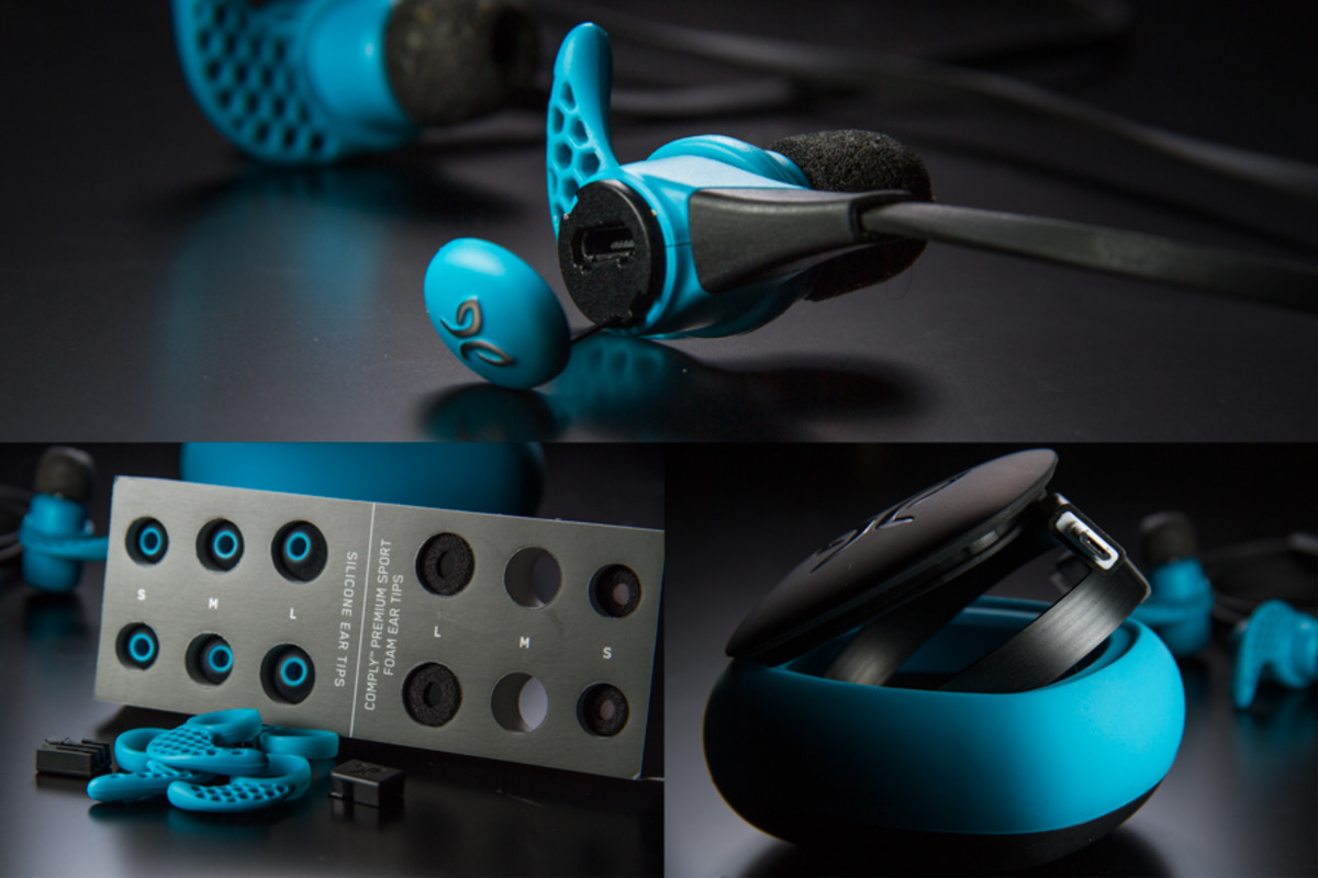 The USB charging port is located behind a convenient, sealed pop-off cover. The X2s come with a plethora of fitting options, as well as a ribbon cord for charging.