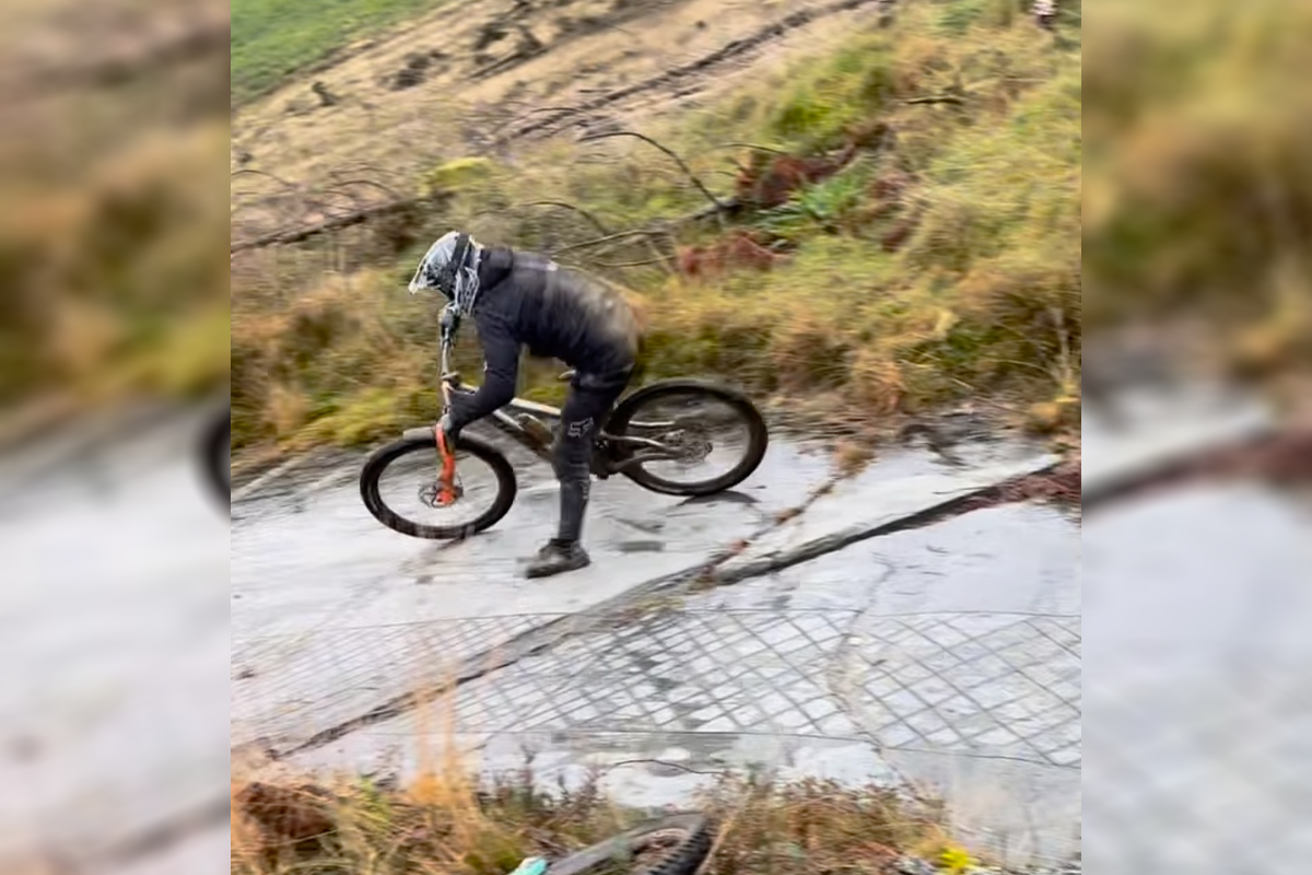 Pictures Slab Riding Rider Tries A Risky Move In The Pouring Rain