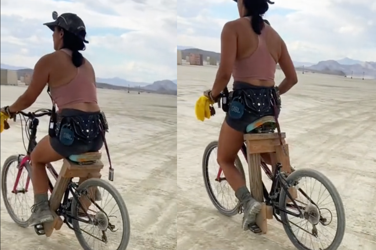 naked man on bicycle