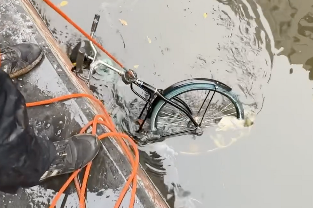 "Fisherman" Hook Abandoned Bikes In Amsterdam's Waterways BikeMag