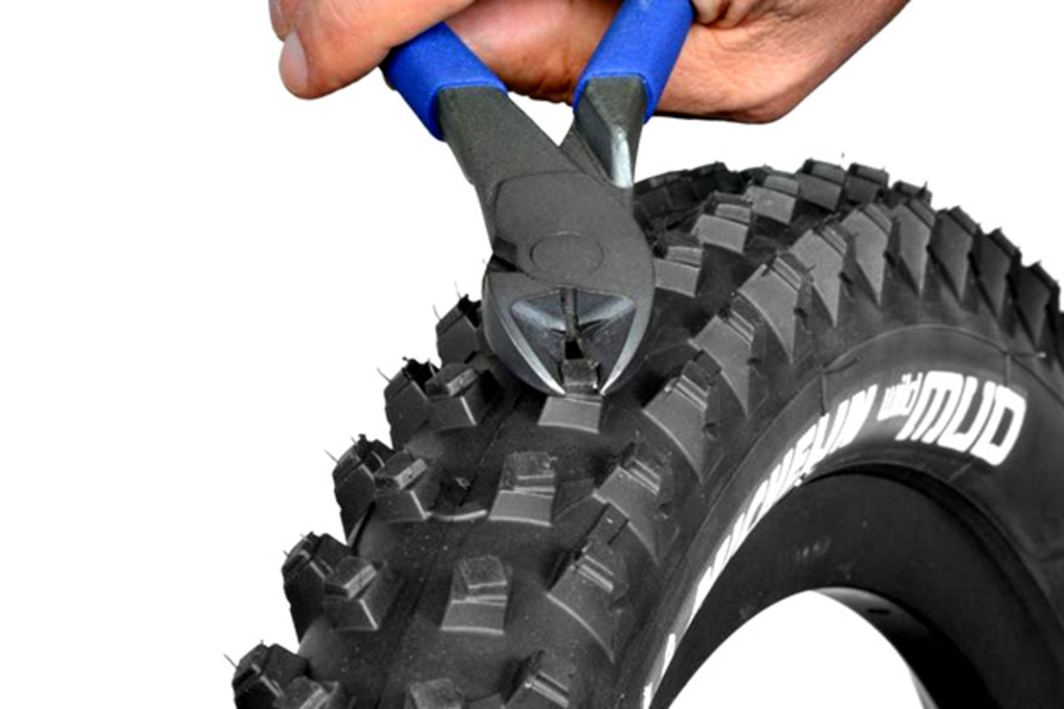 Those knobs are too tall and squirmy for you? Trimming the Michelin Mud is dead simple and will reduce the rolling resistance for drier conditions.