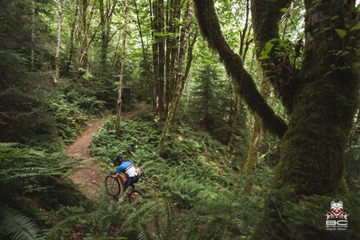 BC Ferries rider Barry Beck motors home through Crumpet woods. | Photo by Dave Silver