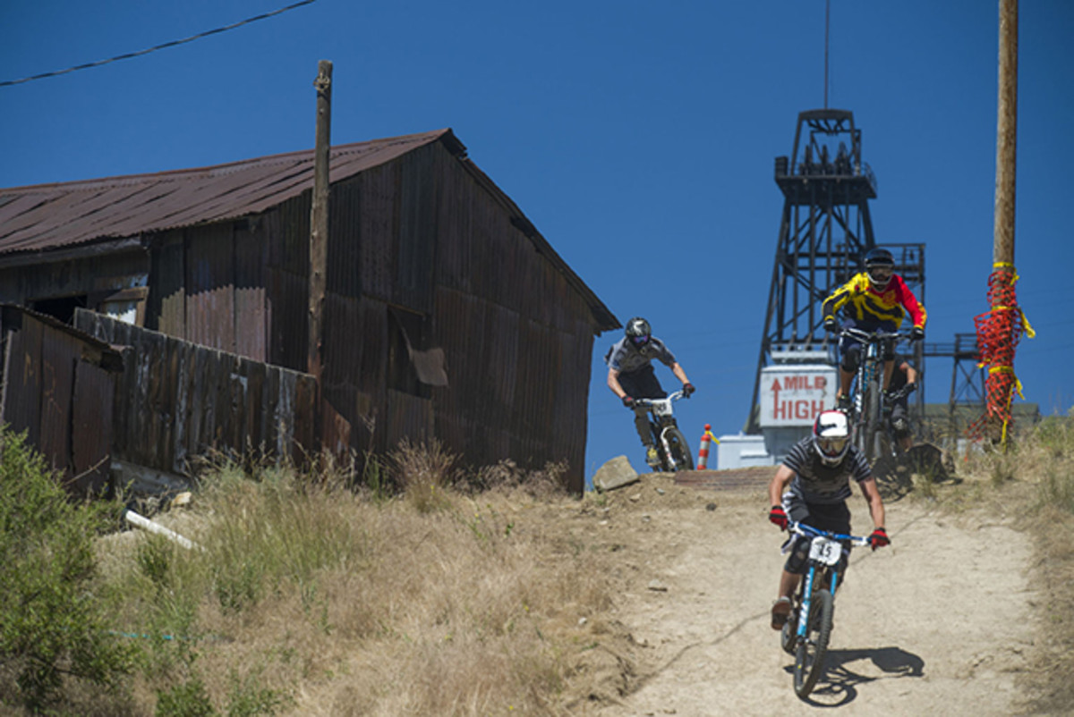 Spectators were treated to fast trains during course inspection. This rustic neighborhood section featured freshly machine built berms leading to the bitchin' Camaro gap jump.