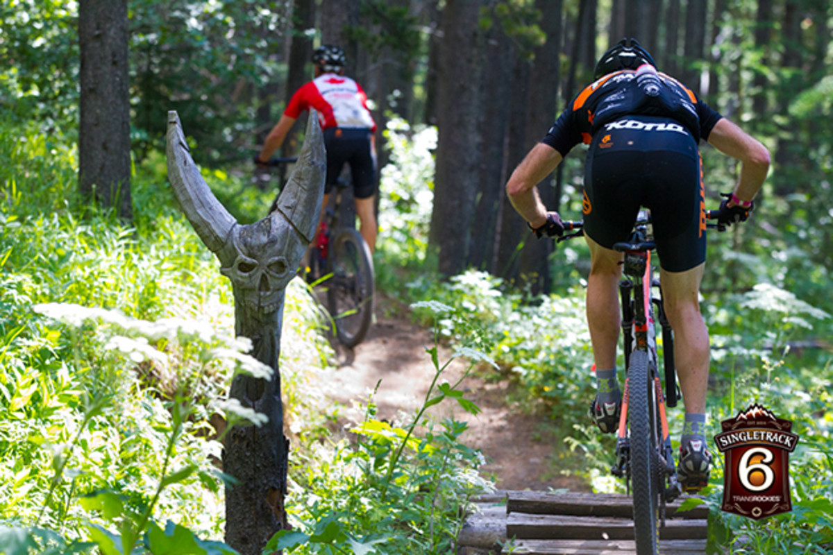Riders entered the first section of trail guarded by this menace It was a fair warning, but the trails turned out to be nothing but heavenly. Narrow winding old school single track climbs, fast, open flow trail descents, and everything in between greeted riders as they would their way up and over Moose Mountain.