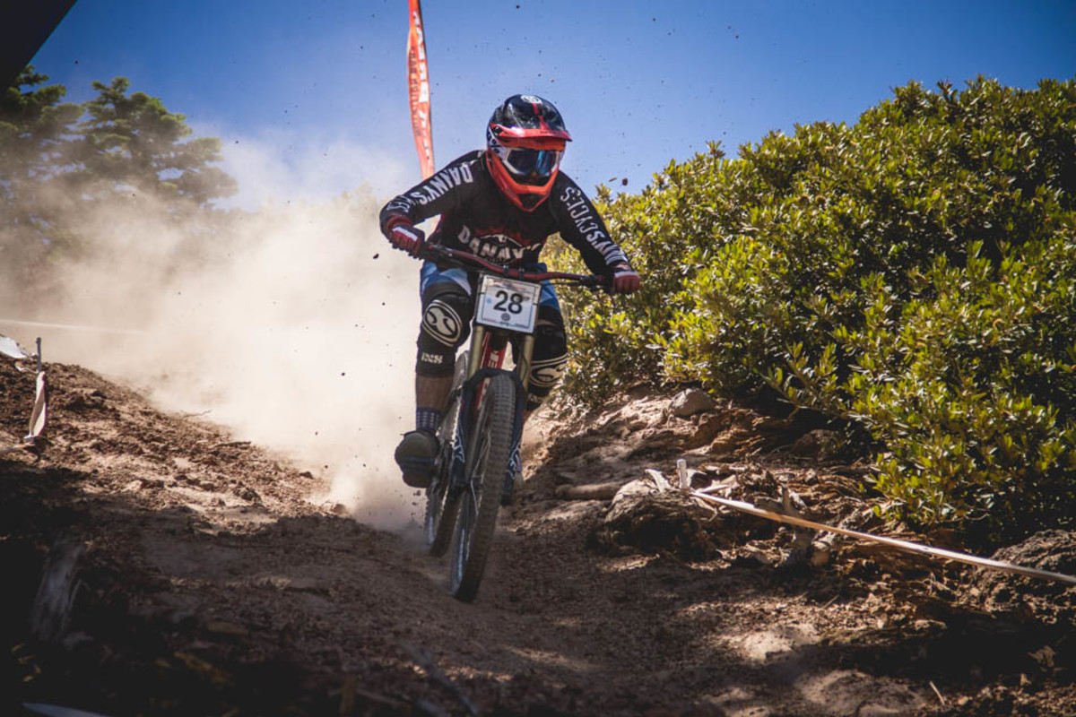 To finish the track, riders decended a near verticle chute of lose pumice. Philip Kmetz lets loose.