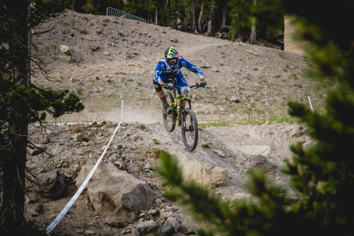 The top of Run 1 was nearly identical to the downhill course. Seamus Powell drops in to start off the pro men's.