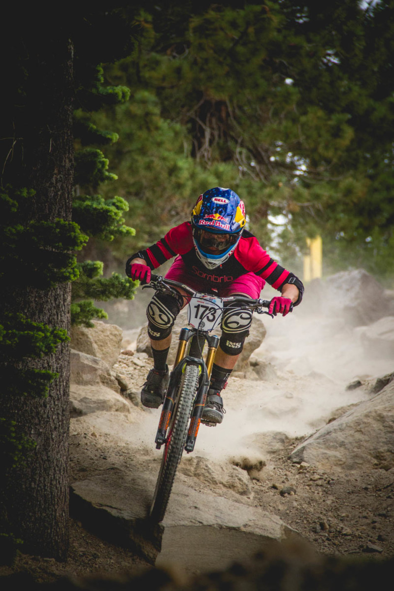 According to Kintner herself, she hadn't pre-ridden the last two run of the enduro. The lift that riders took up for the last run went directly over this section of Run 4, and as Kintner was riding up I heard her call down to a spectator to ask if the trail below was in fact Run 4. She came down very quick for someone that was completely winging the run.