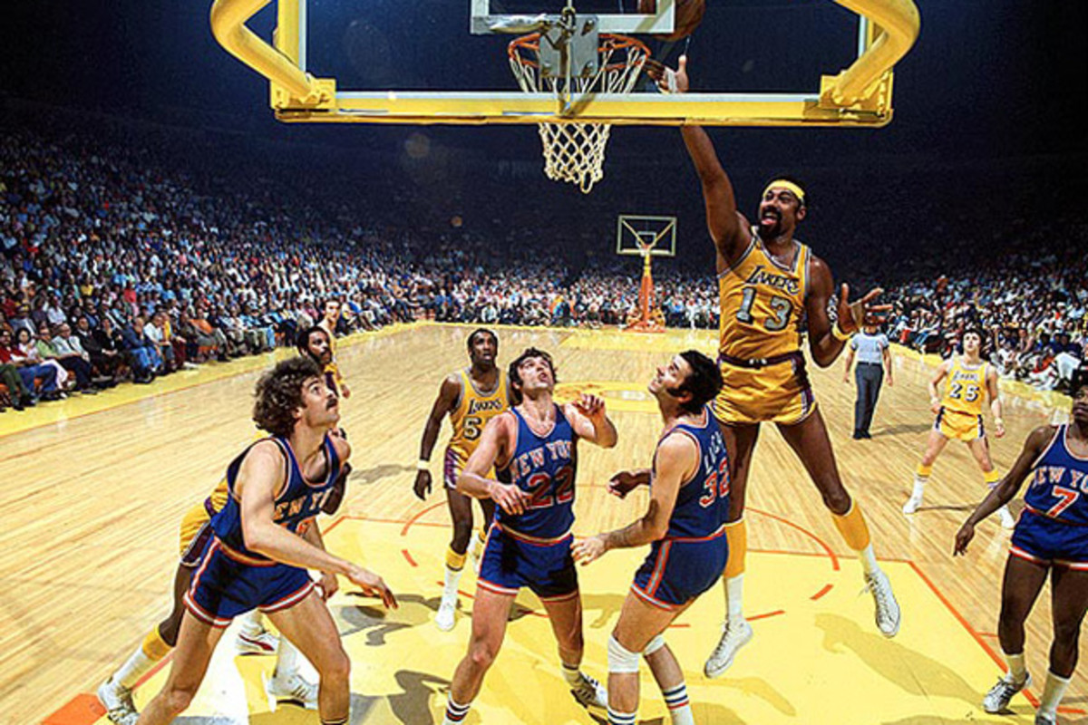Do you know who can get away with wearing long socks? Wilt Chamberlain. And only Wilt Chamberlain. If you can step up and make every other man within 100 miles immediately feel inadequate, then you too can rock knee-high socks with immunity. If you ain't Wilt, ditch the damn socks. This rule, by the way, is known among sock scholars, as "The Chamberlain Clause". Respect it.