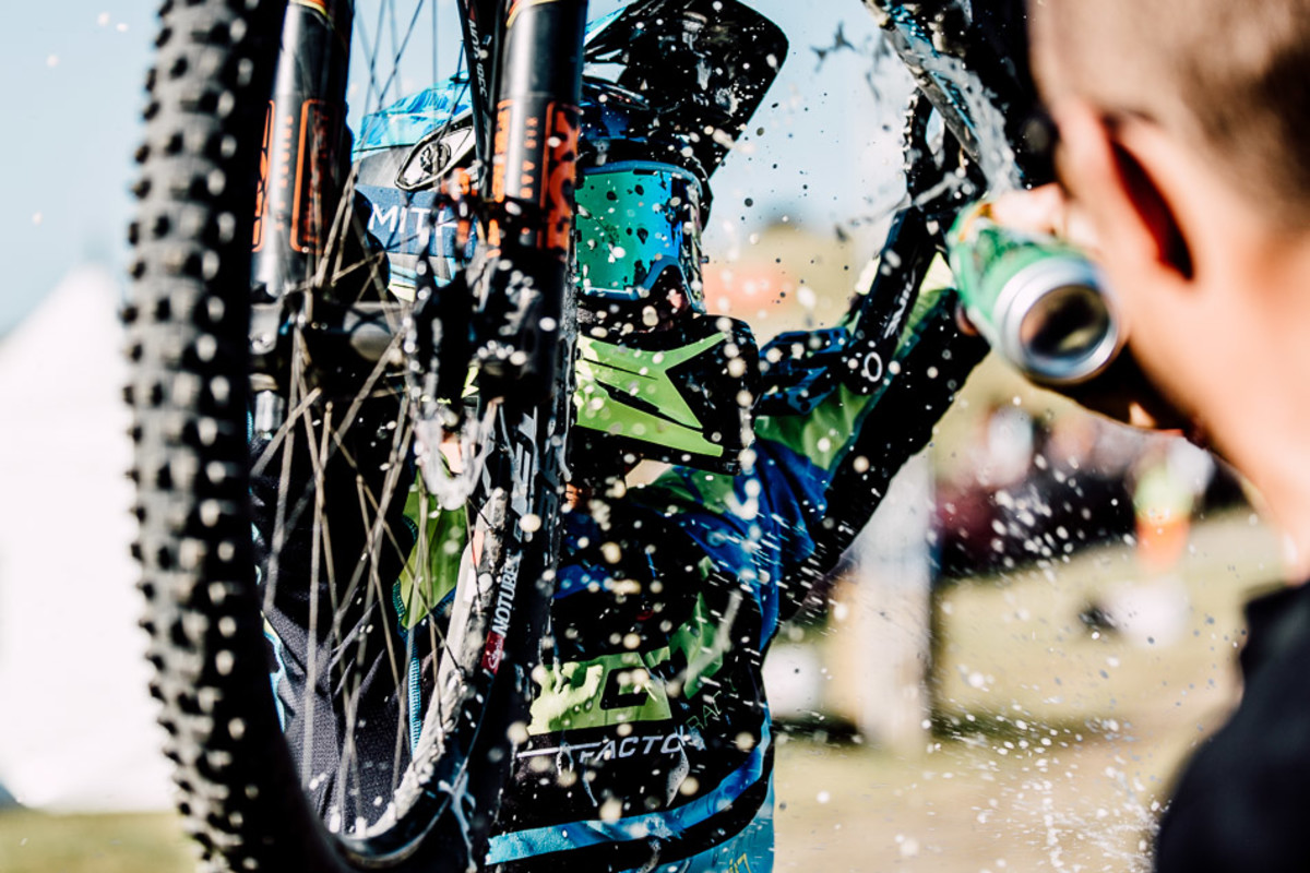 Martin Maes definitely earned his victory beer shower, but at age 19, he's not legally entitled to actually drink any of it underneath the Stars and Stripes of the American flag.