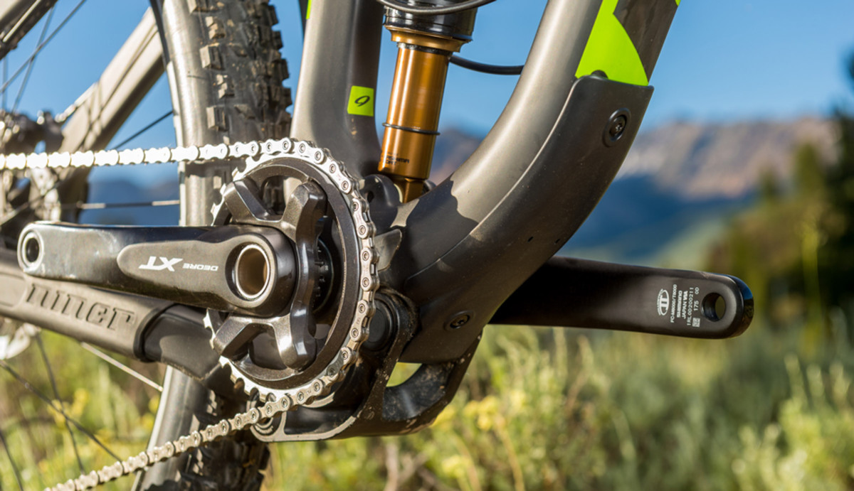 The exit port for internal cable routing and Di2 battery storage is hidden under the downtube protector.
