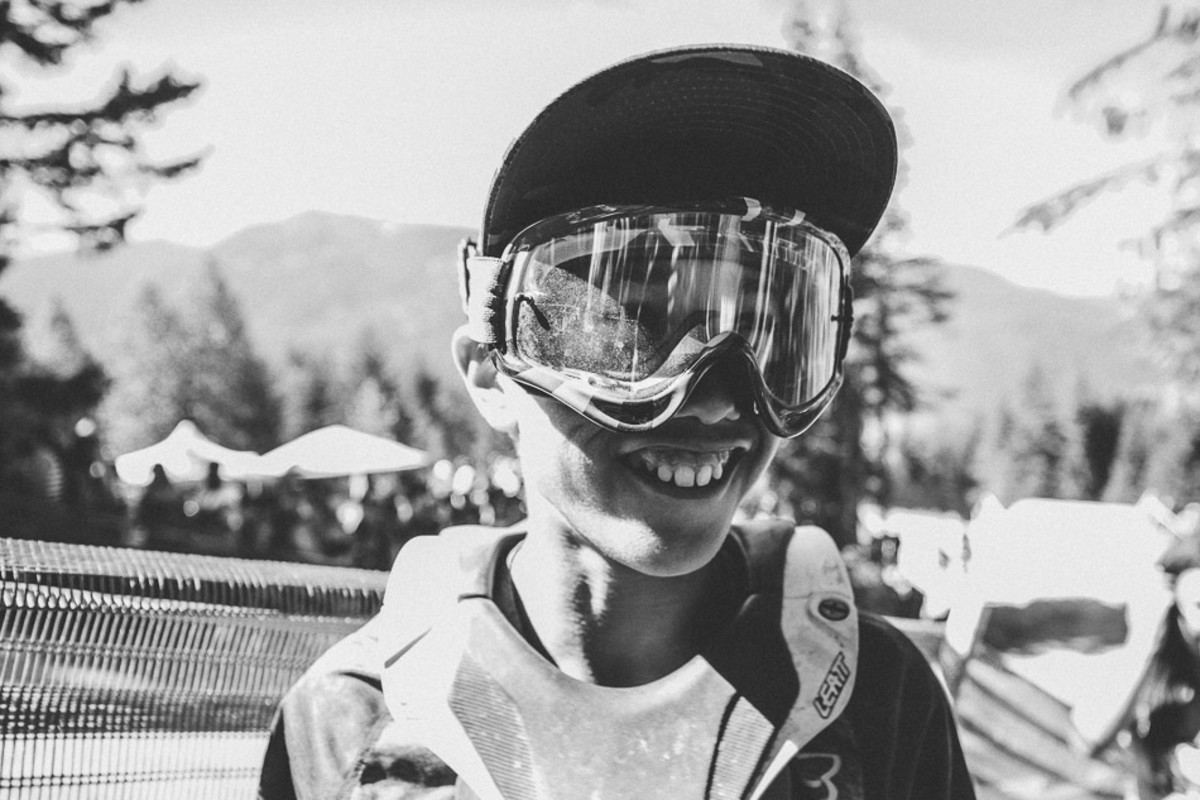There was so much dust blowing off the jumps that it forced some young fans to go full enduro. Photo: Anthony Smith
