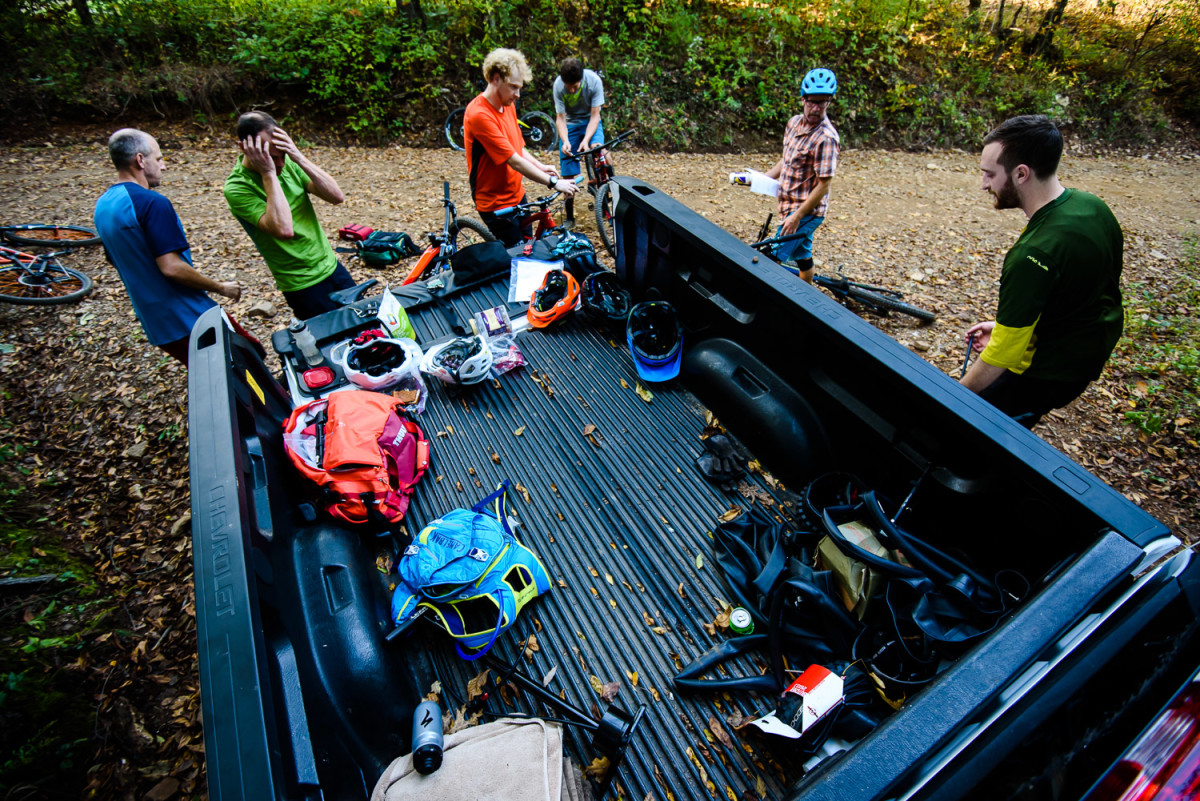 Smashing out one test loop after another can be tiring business, so it helps to have a trusty Chevy pickup at the trailhead for snacks and sustenance while completing forms and swapping out bikes.