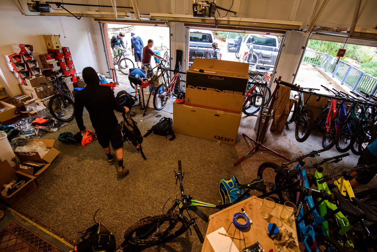During the first week of October, FedEx and UPS trucks dropped off dozens of bike boxes and soft-goods shipments to the Phat Tire Bike Shop in Bentonville, Arkansas, where this year's mechanic—Scott Schroen—built the bikes and delivered them to our communal living quarters in Bella Vista. Each morning for the following two weeks, our garage is a scene of controlled chaos as 10 testers set up their bikes for a fun day of shredding. One morning our test crew even spotted a hooded bike thief lurking in the garage.